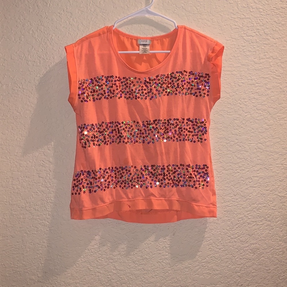 A cute top in the brand piper